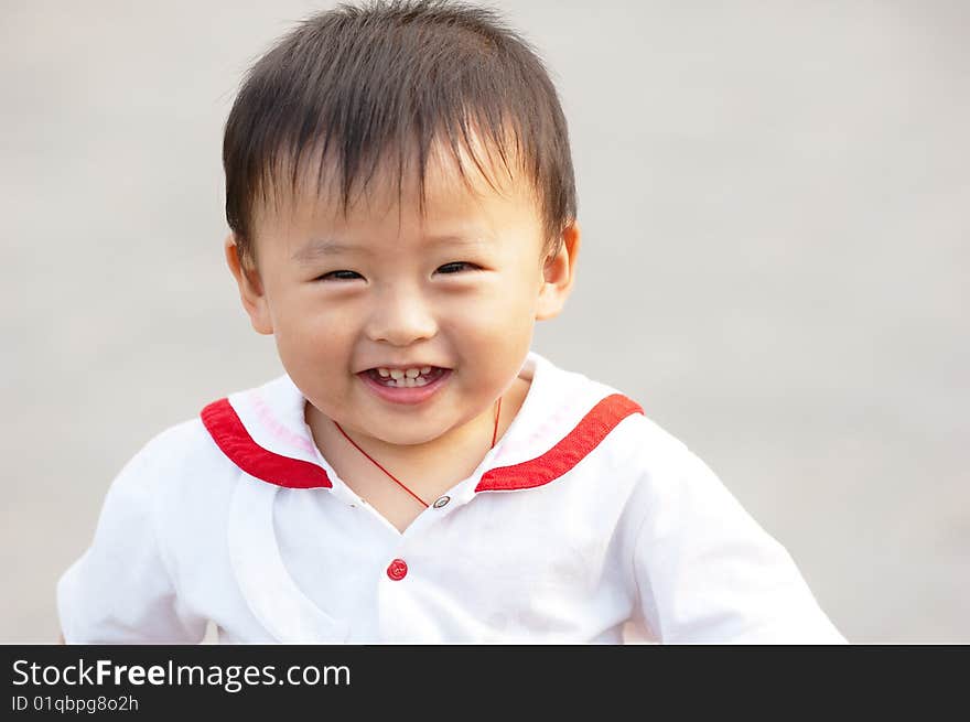 Portrait of happy boy laughing