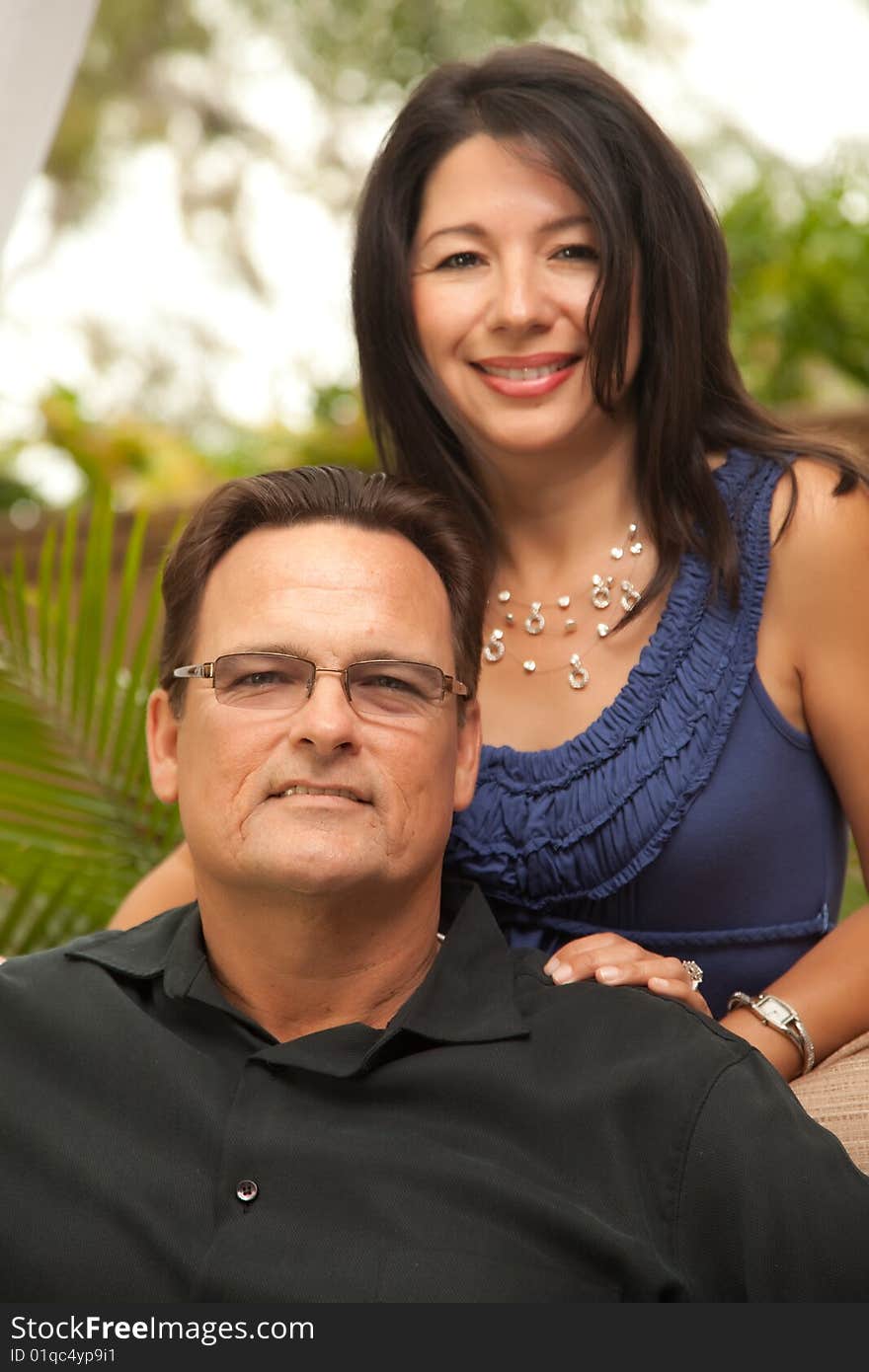 Happy Attractive Hispanic and Caucasian Couple Portrait.