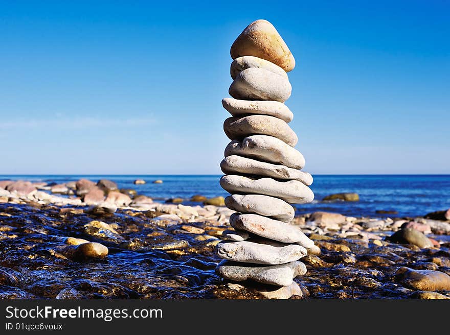 Set up pile stones on the sea shore. Set up pile stones on the sea shore