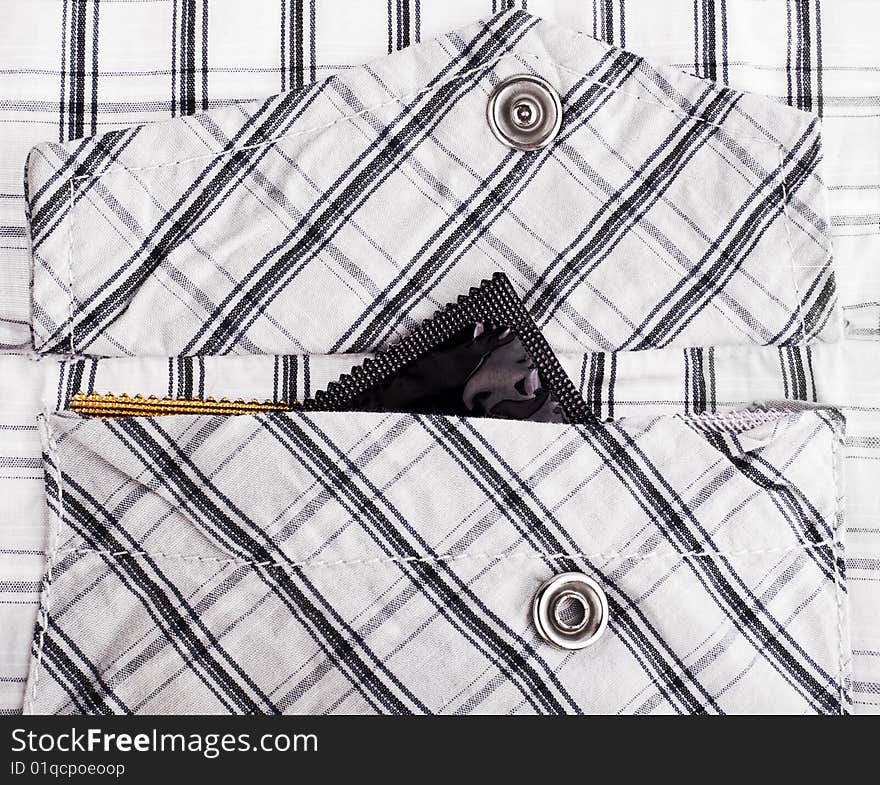 Ready to date: condoms in shirt pocket close-up