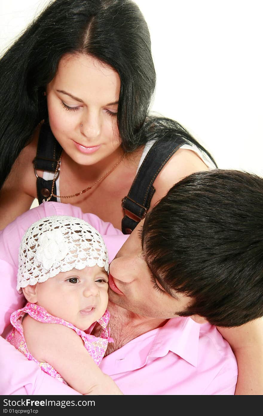 Happy family with newborn daughter