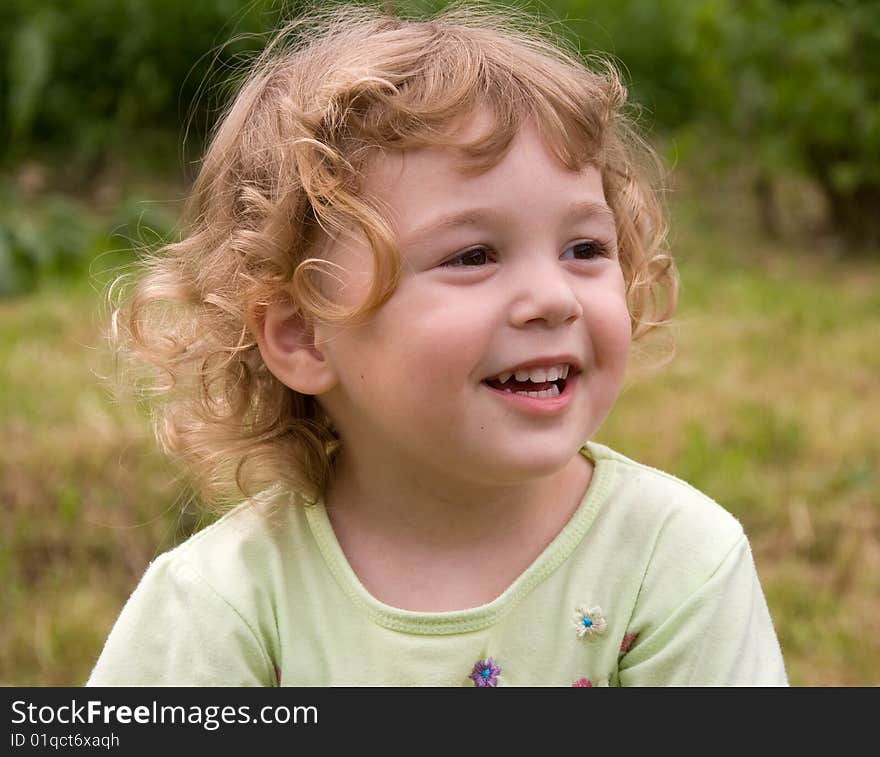 Nice little girl in the garden. Nice little girl in the garden