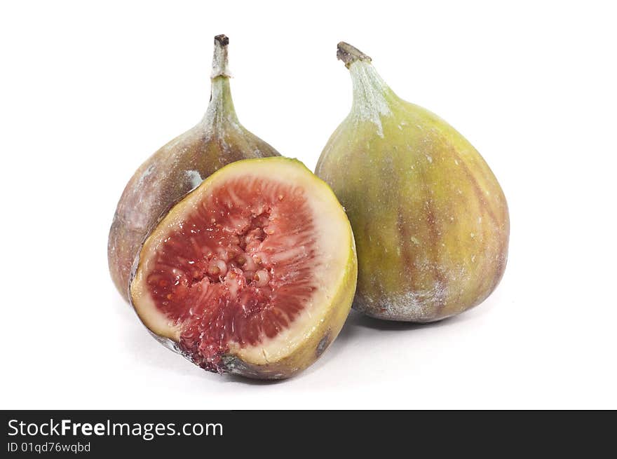 A small group of figs isolated on a white background