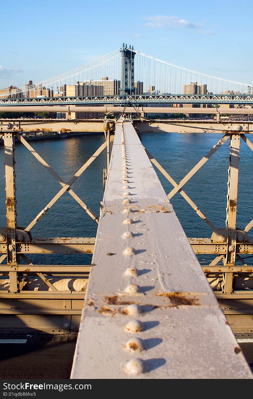 View of the Manhattan Bridge seen from the Brooklyn Bridge in New York city, USA.