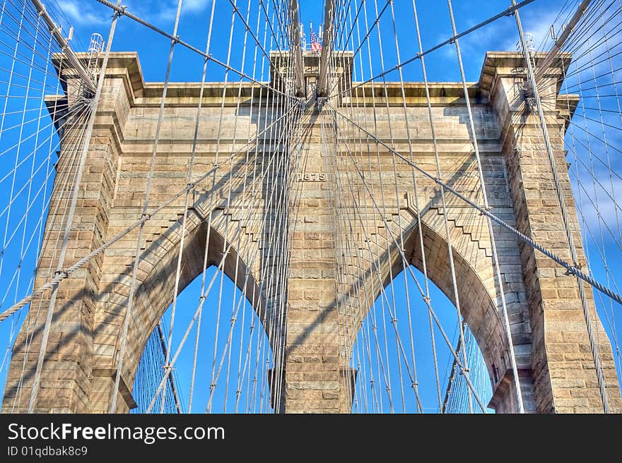 View of some architectural detail of the Brooklyn Bridge in New York city, USA.