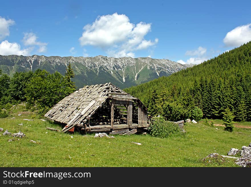 Old house on mountain plateau in Carpathian mountains