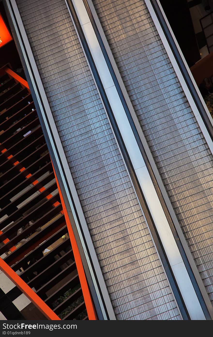 Moving staircase in a big business center. Moving staircase in a big business center