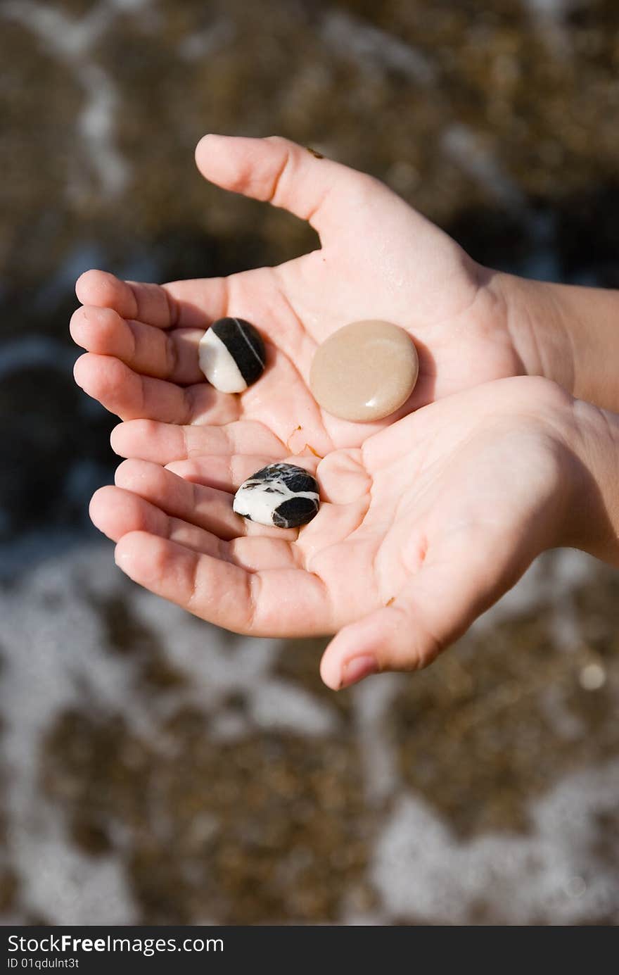 Pebble on hands