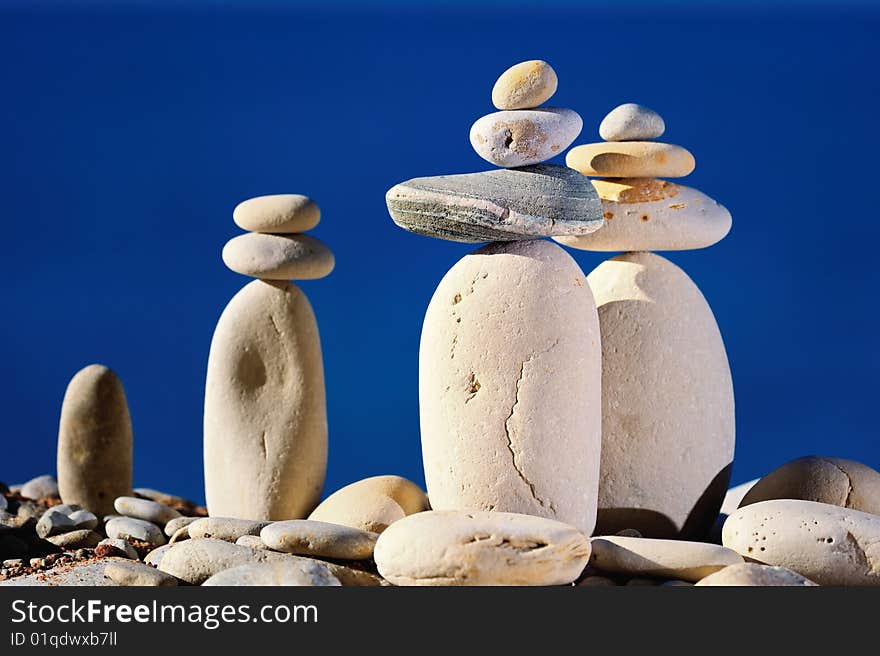 Group several types of gravel on the blue background. Group several types of gravel on the blue background