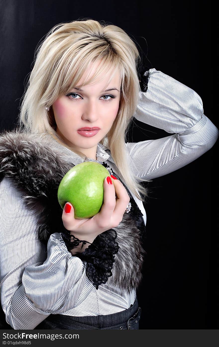 Girl in fur with apple. Girl in fur with apple