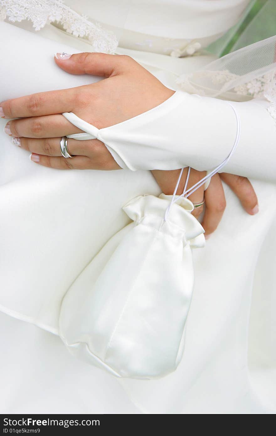 The bride stretches a hand with a ring. The bride stretches a hand with a ring