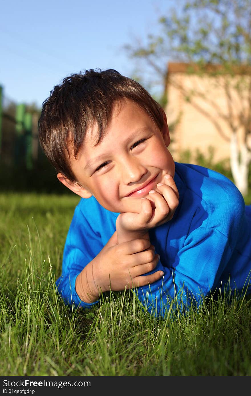 Little boy in green grass