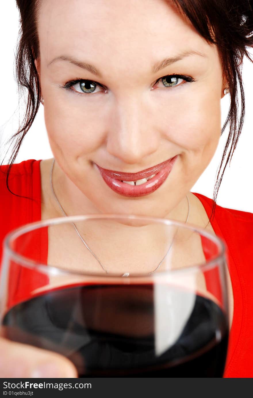 Attractive woman with a glass of red wine isolated on white