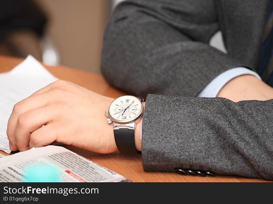 Men S Hands With Watches On The Table