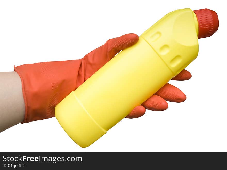 Female hand in a red rubber glove holding a yellow bottle isolated on white background. Female hand in a red rubber glove holding a yellow bottle isolated on white background