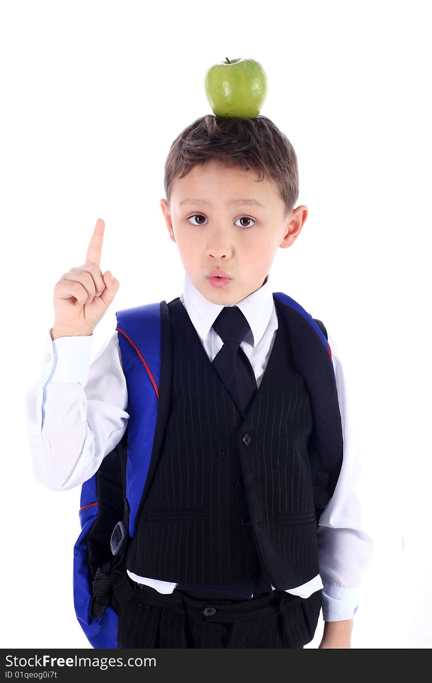 Schoolboy with backpack and apple isolated on white. Schoolboy with backpack and apple isolated on white