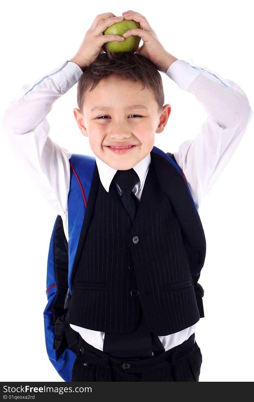 Schoolboy with backpack and apple isolated on white. Schoolboy with backpack and apple isolated on white