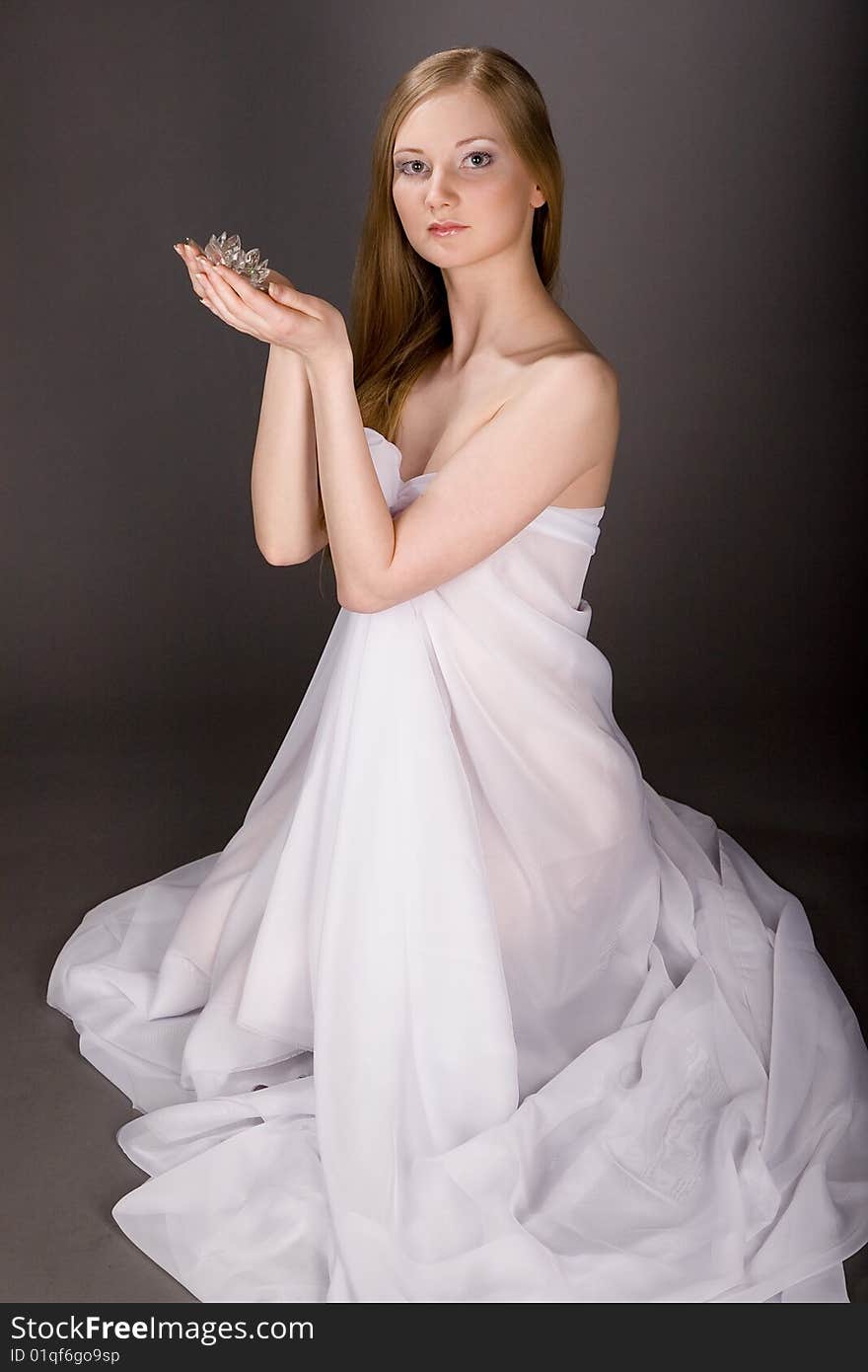 Lovely girl with crystal flower