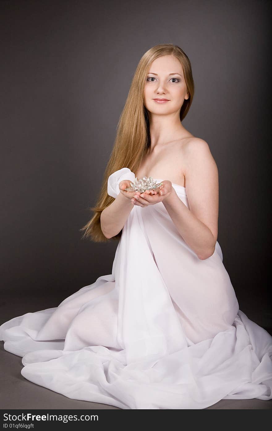 Lovely girl  with  crystal  flower