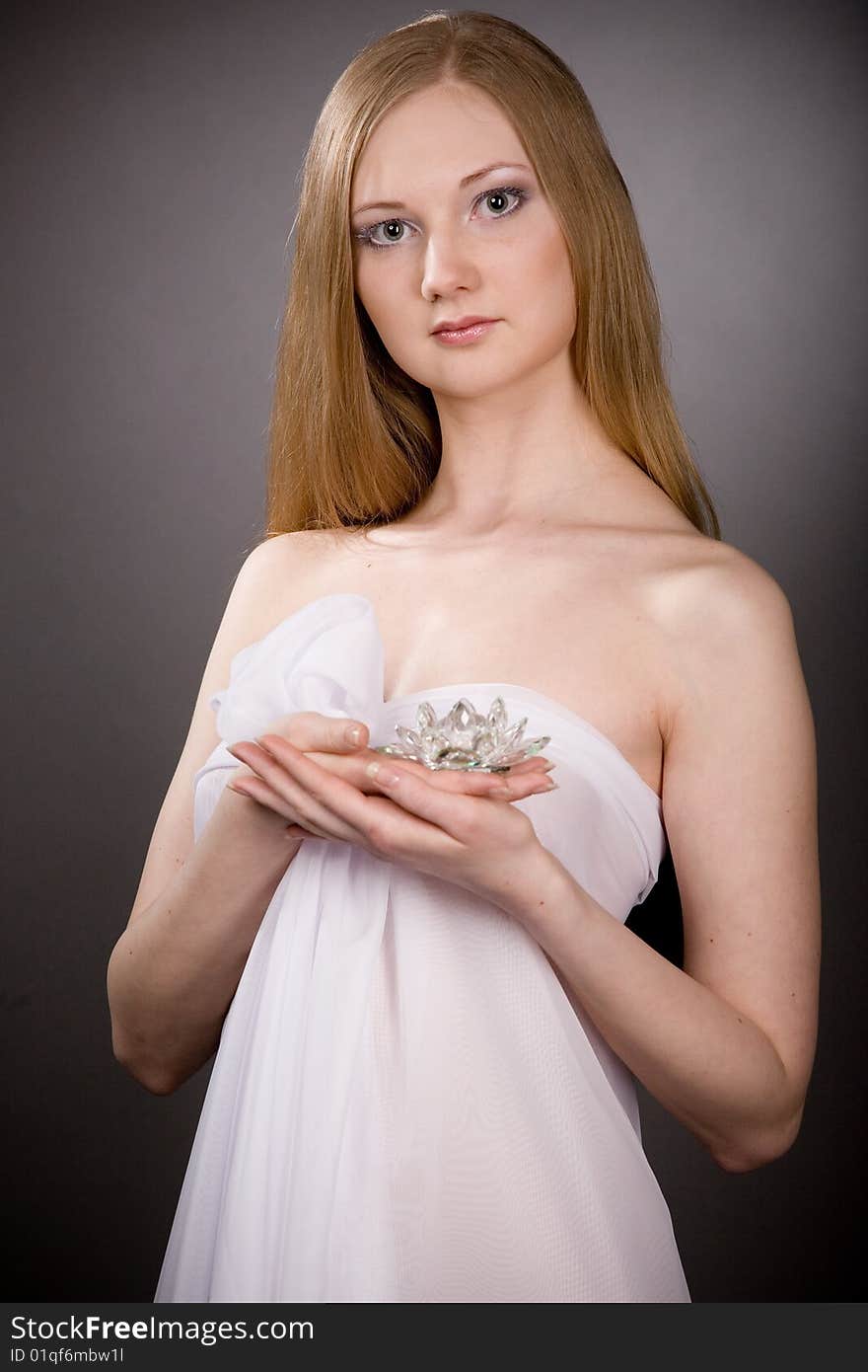 Lovely girl  with  crystal  flower