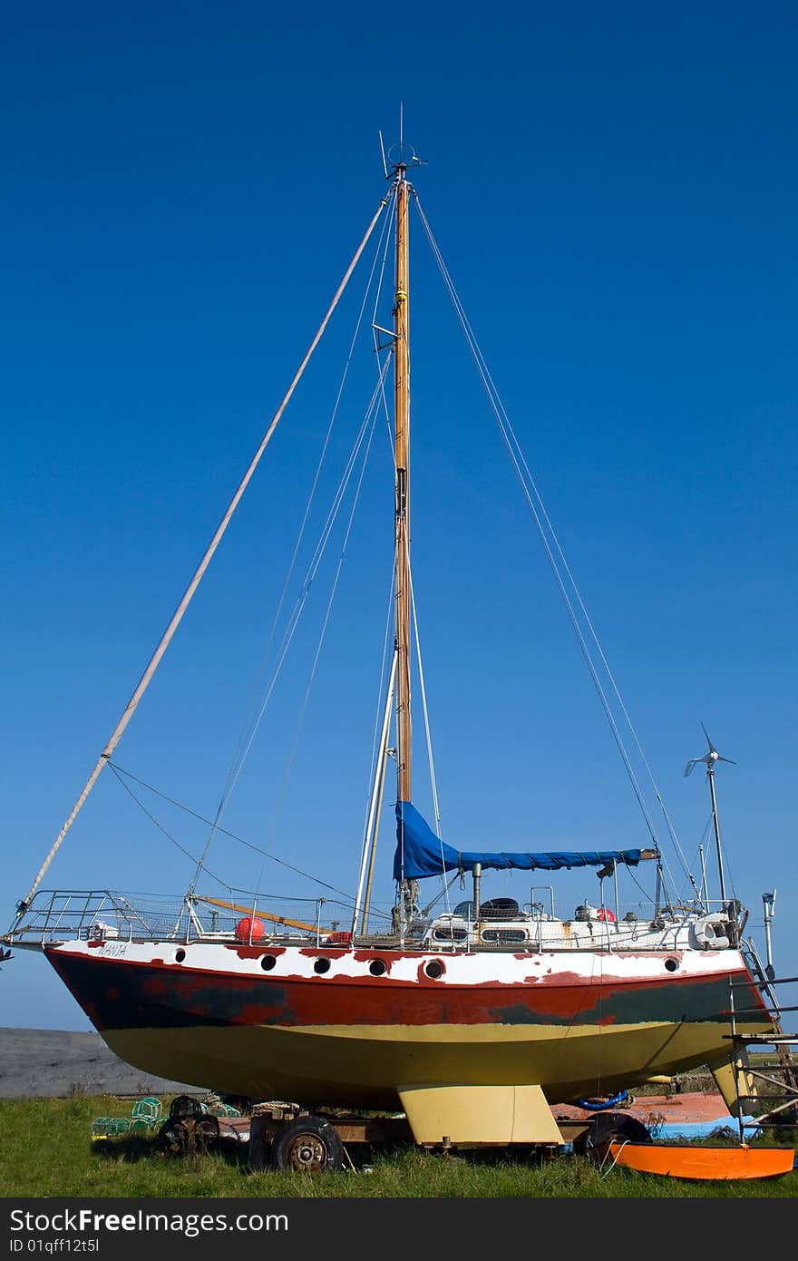 Sailing boat being repaired on the Holy Island of Lindisfarne