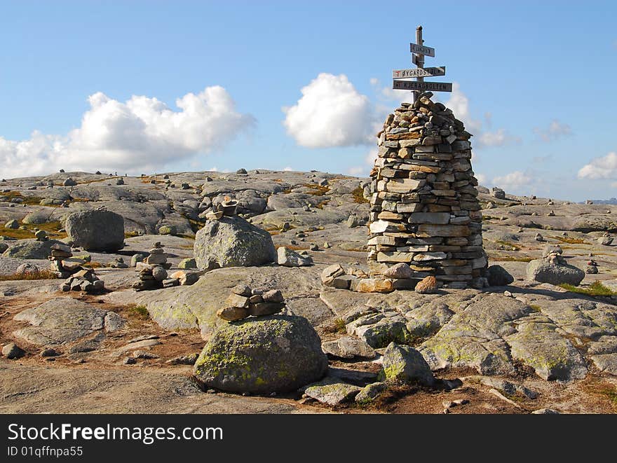 Small building made of stones - In background clouds. Small building made of stones - In background clouds