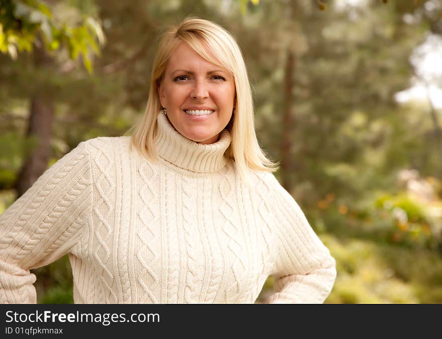 Attractive Blonde Woman Portrait in the Park. Attractive Blonde Woman Portrait in the Park.