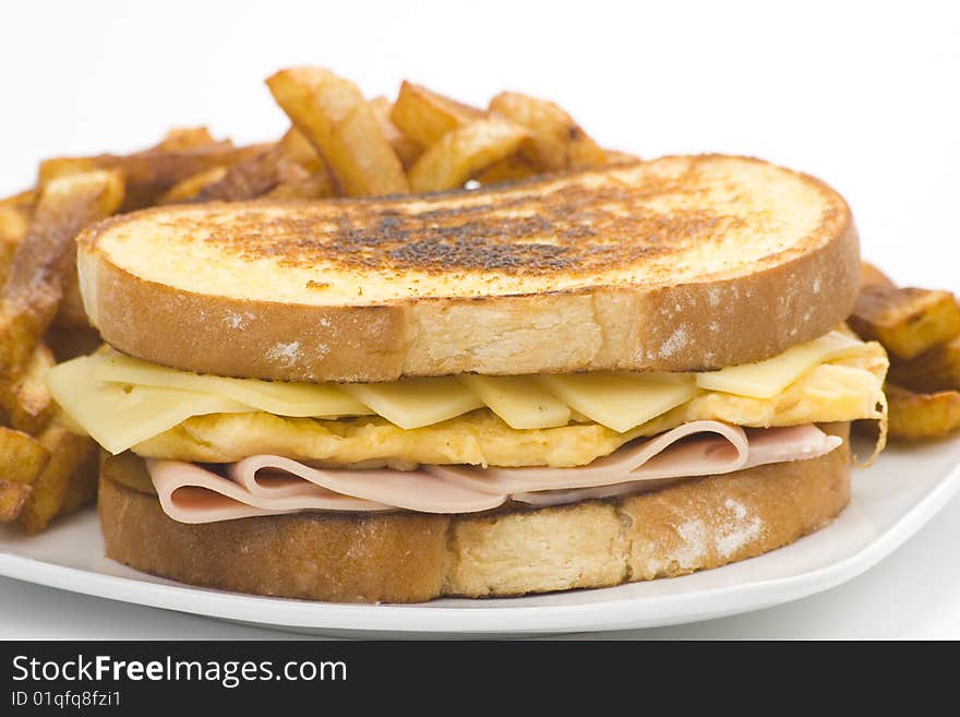 Tasty sandwich of ham and cheese omelet isolated