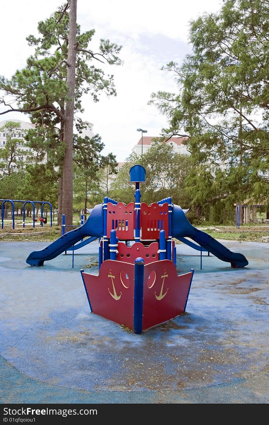 A playground with slides shaped into a boat