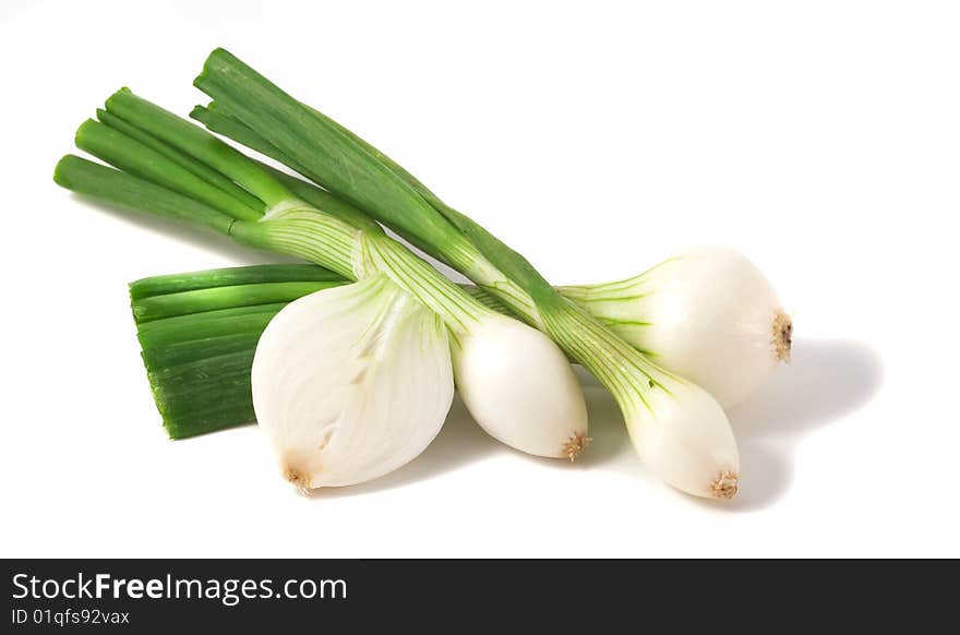 Group of fresh onions isolated on white background. Macro photo. Group of fresh onions isolated on white background. Macro photo.