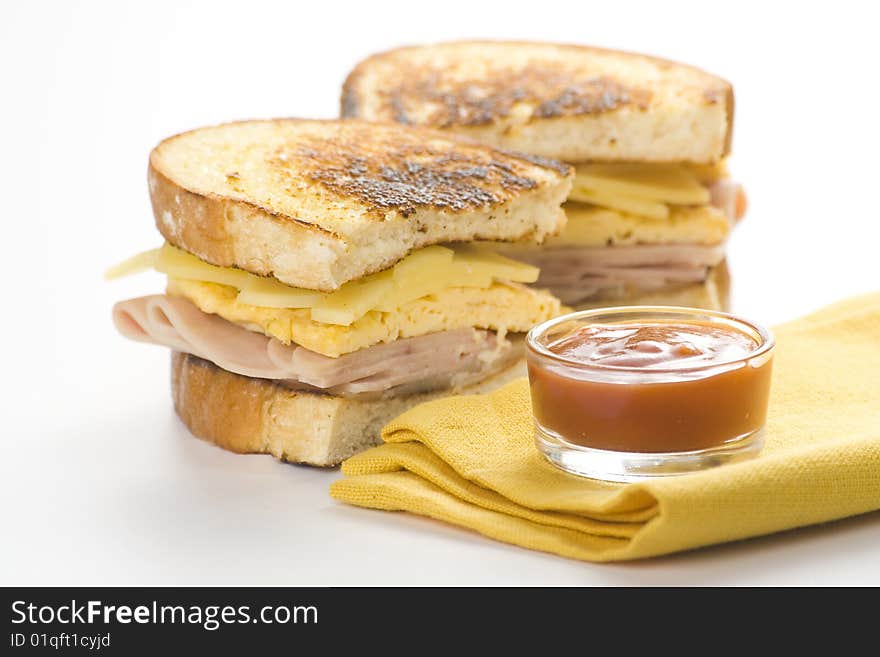 Tasty sandwich of ham and cheese omelet