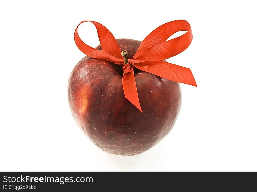 Apple with red bow