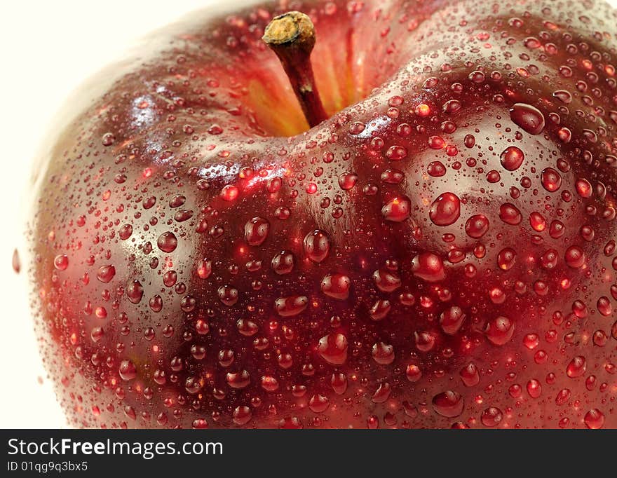 Red delicious apple with droplets on it. Red delicious apple with droplets on it