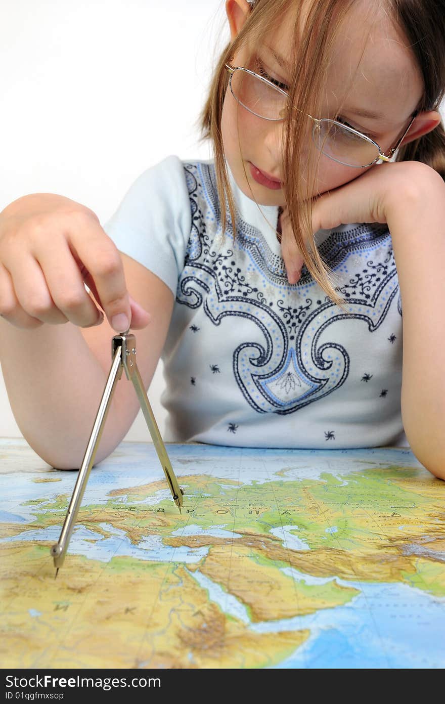 Girl Exploring The Map Of Eurasia