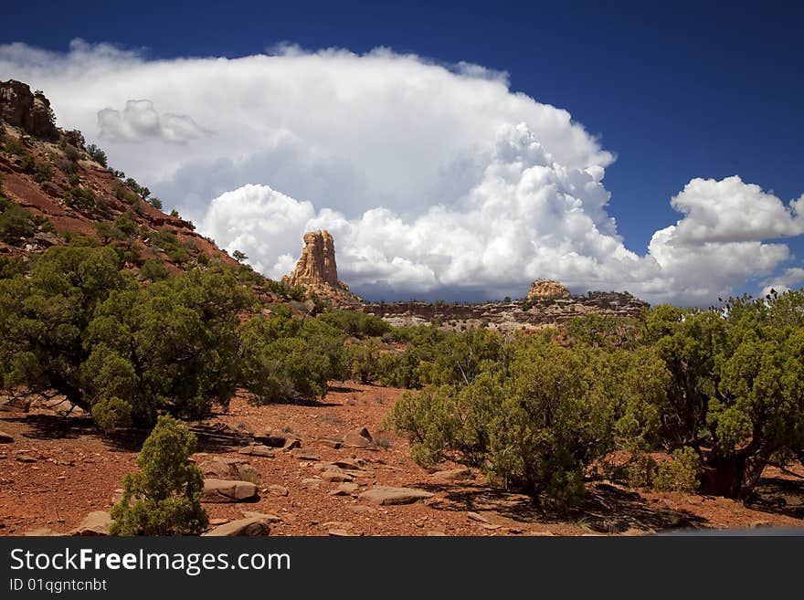 View of red rock formations in San Rafael Swell with blue sky�s the and clouds