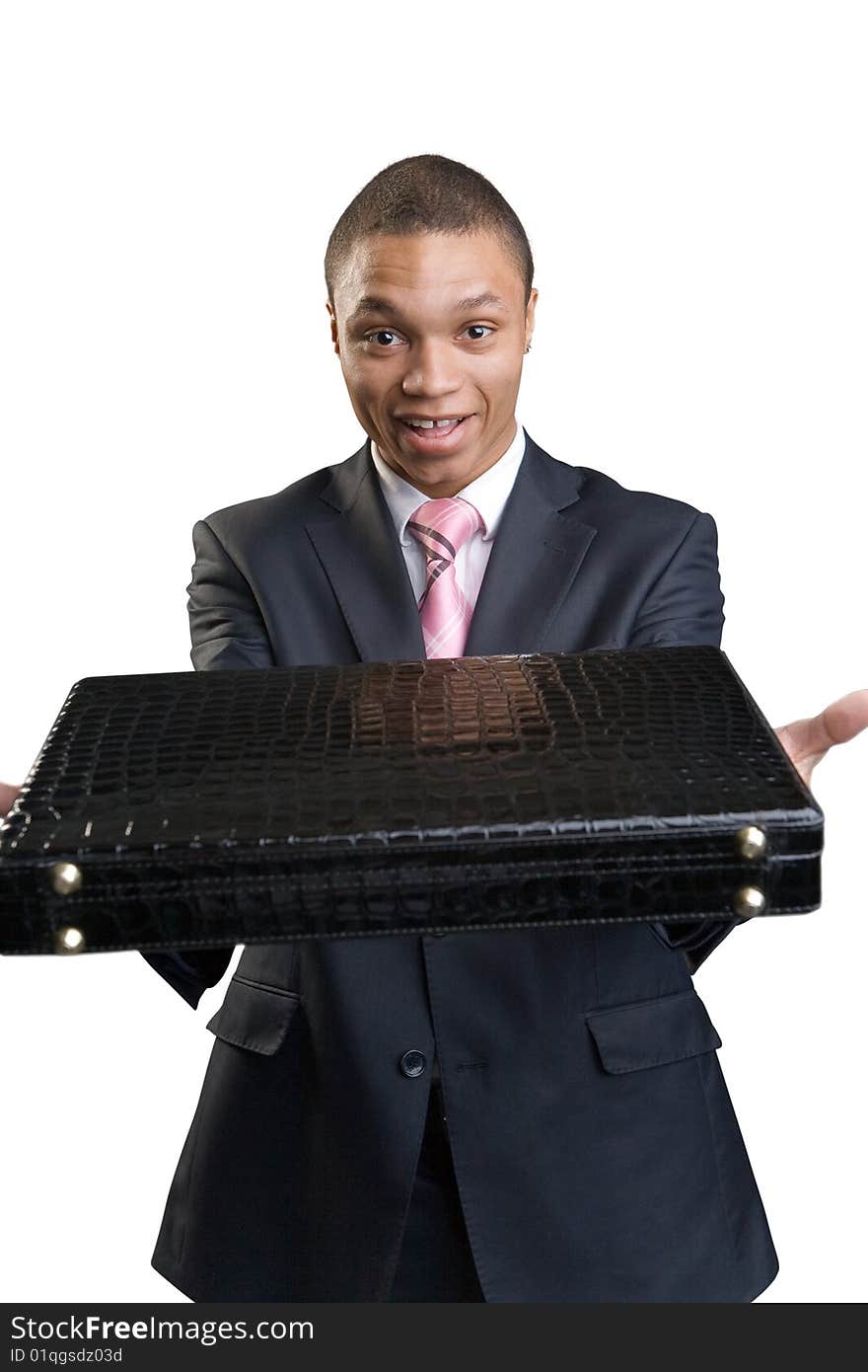 The happy businessman offers briefcase on a white background