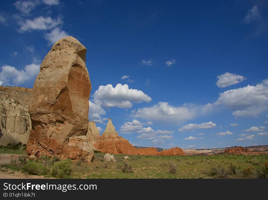 View of the red rock formations in Kodachrome Basin with blue skys and clouds