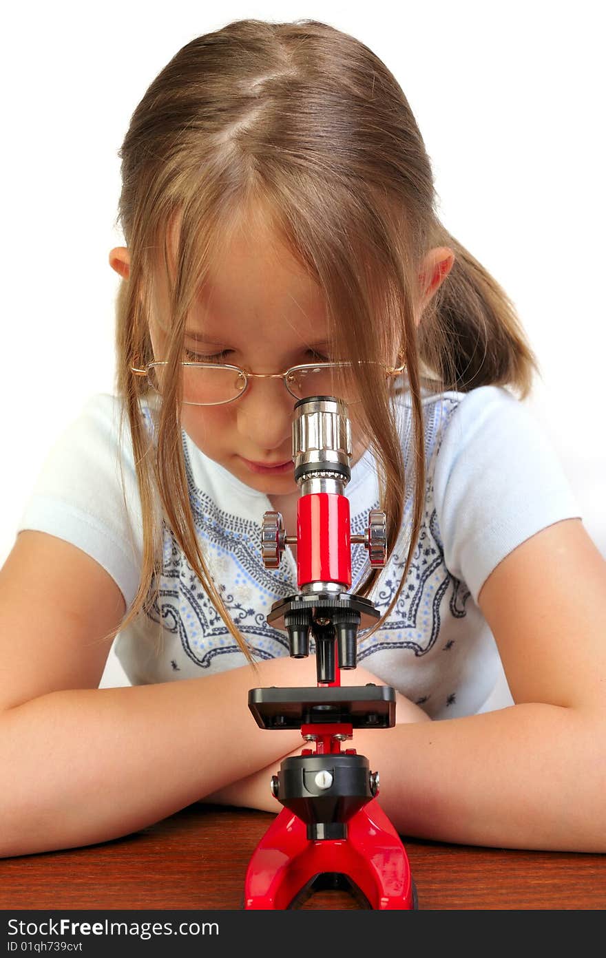 Girl Studying Something With Microscope