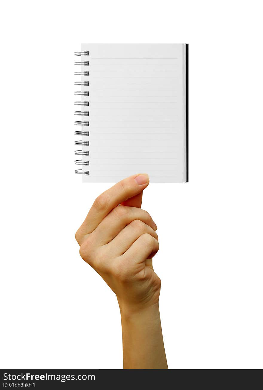 A notebook in a hand. A notebook in a hand