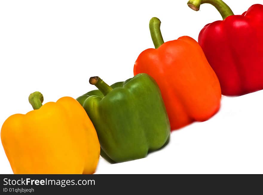 Photo of colorful peppers on white