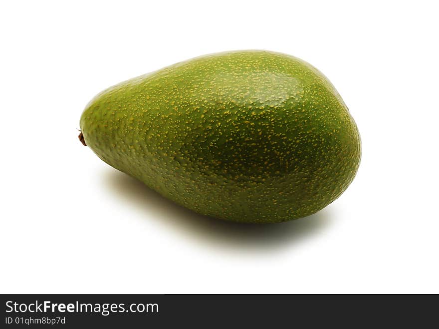 Green avocado isolated on white