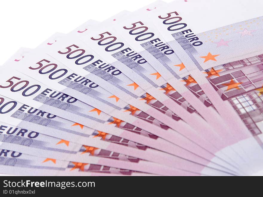 Euro banknotes closeup on white