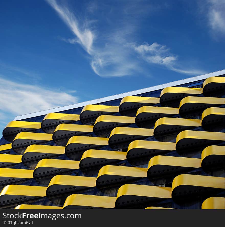 Building of offices with balcony yellow. Building of offices with balcony yellow