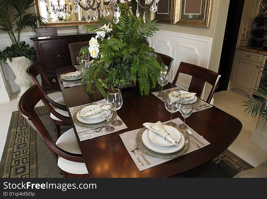 Dining table with luxurious tableware and decor. Dining table with luxurious tableware and decor.