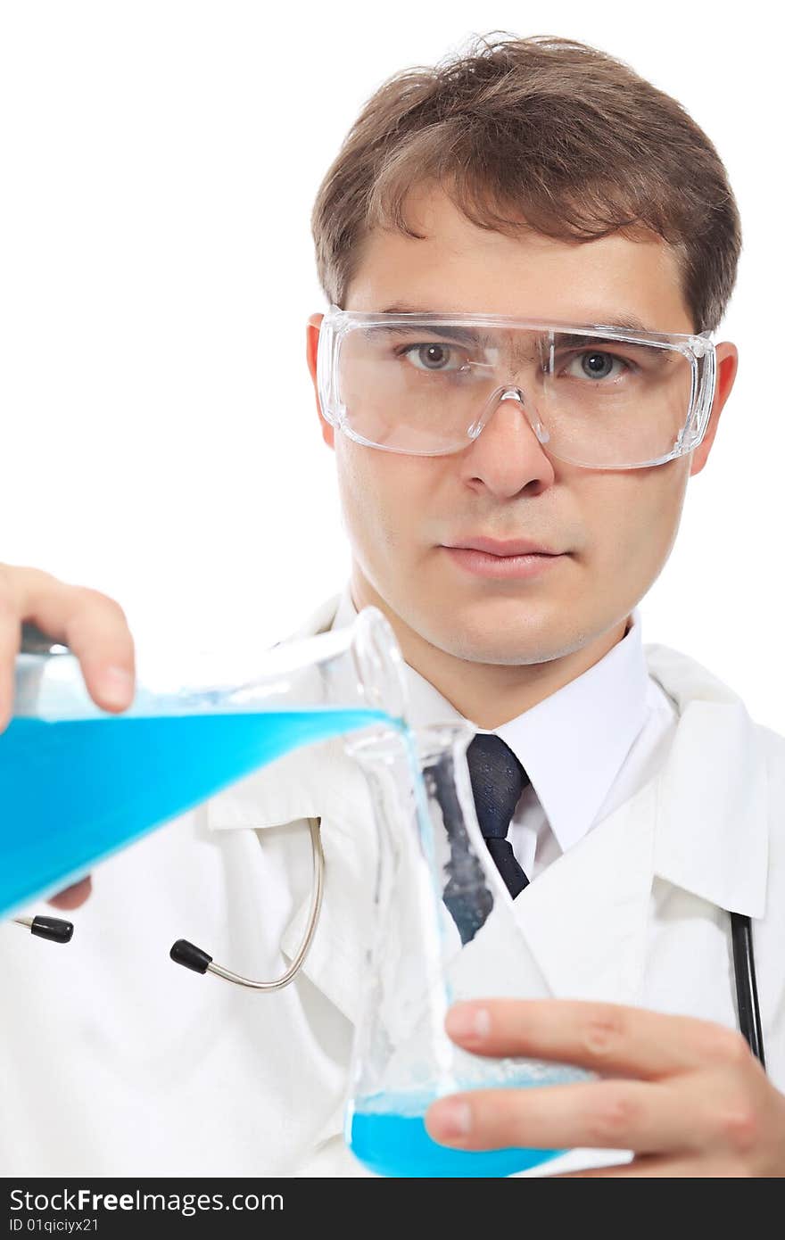 Medical theme: serious doctor working in a laboratory. Medical theme: serious doctor working in a laboratory.