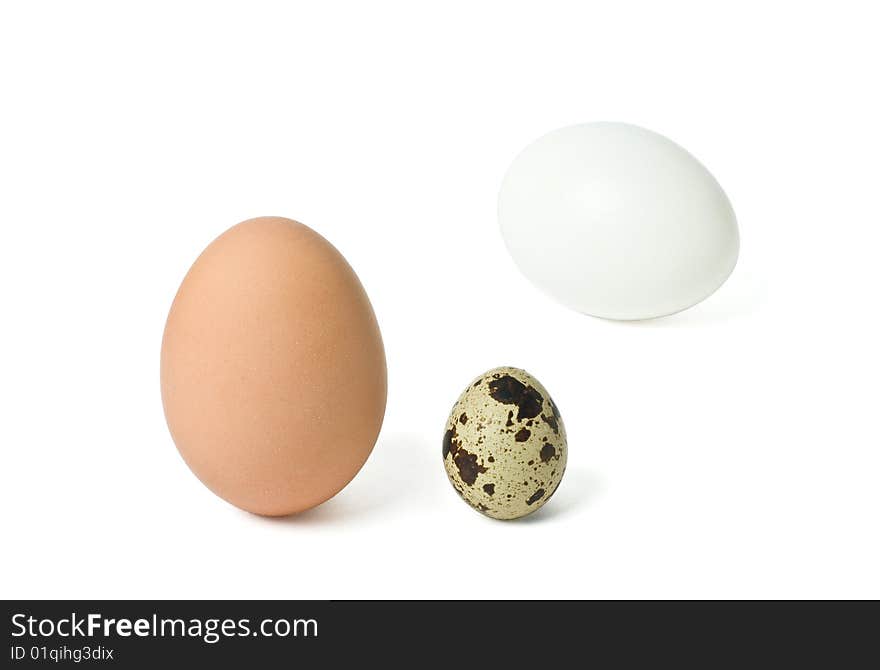 Three eggs isolated on white background close up