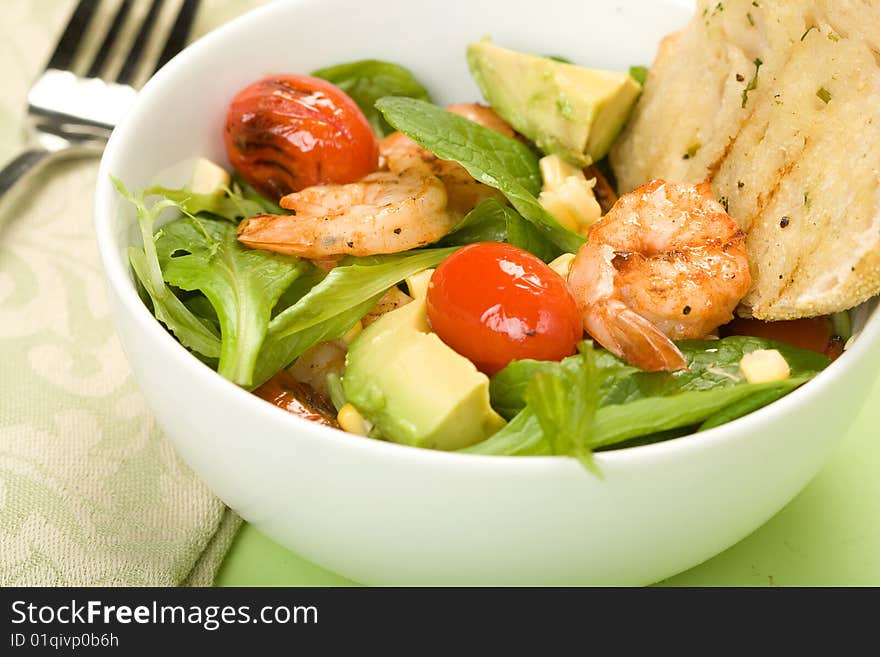 Grilled Shrimp salad with mache served with grilled bread