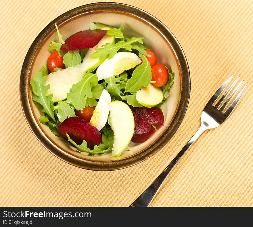 Arugula Salad in dark metallic glazed bowl