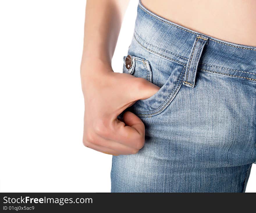 Silverwomans thumbs hooked in jeans pocket