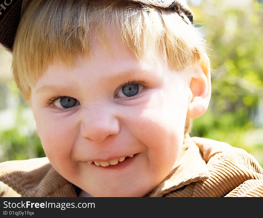 The boy on walk in the spring. The boy on walk in the spring